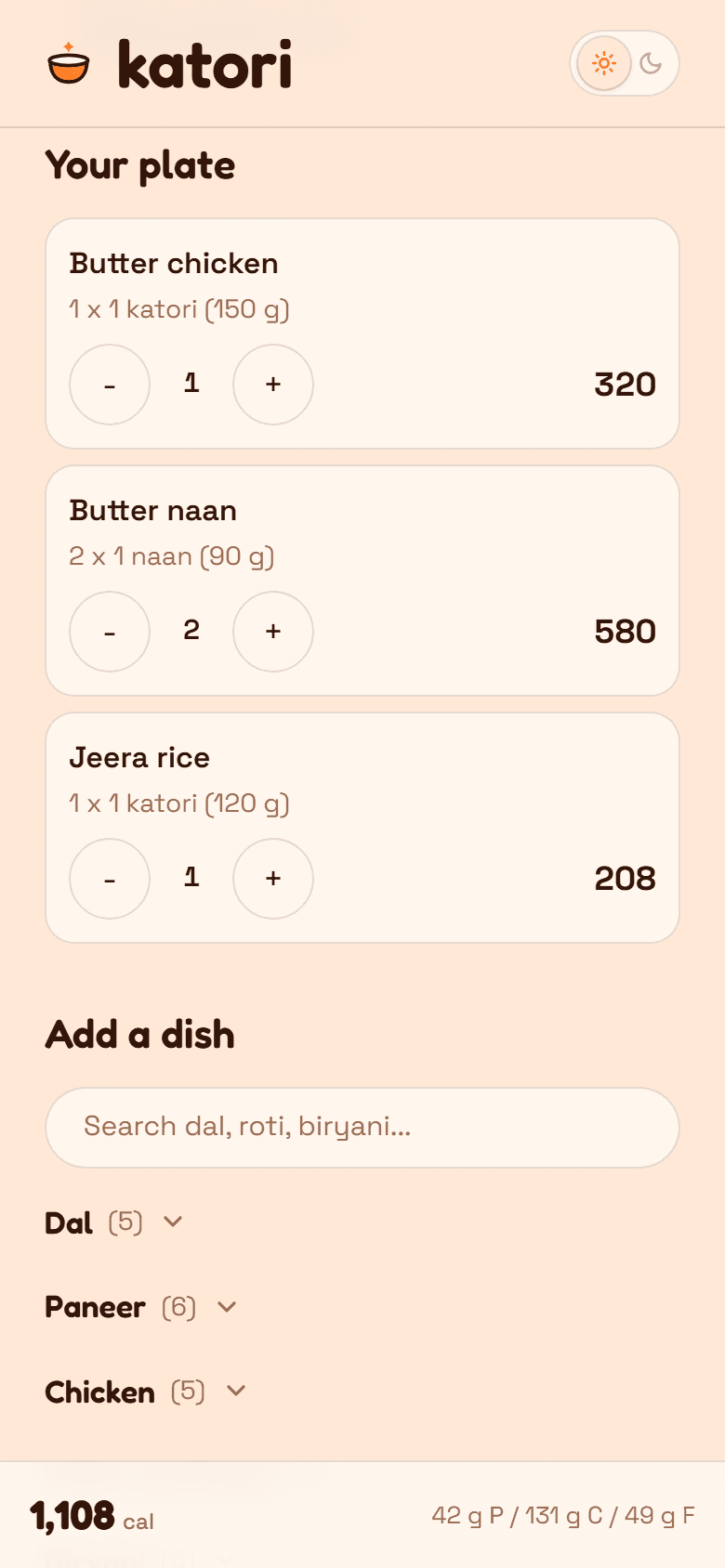 The Katori Indian food calorie calculator on a phone, with a restaurant plate of butter chicken, two butter naan and jeera rice totalling 1,108 calories